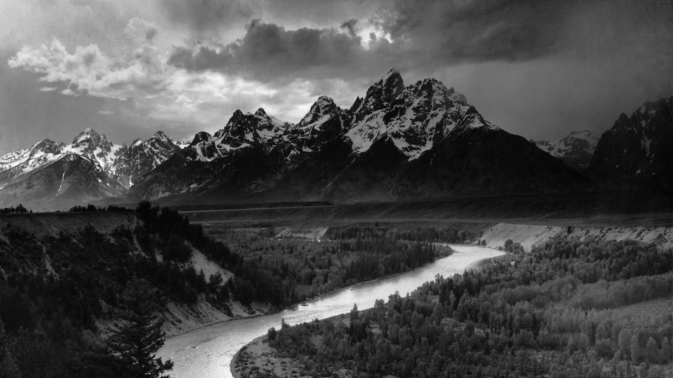 The Tetons and the Snake River, fotografía de Ansel Adams con el río en curva hacia las montañas